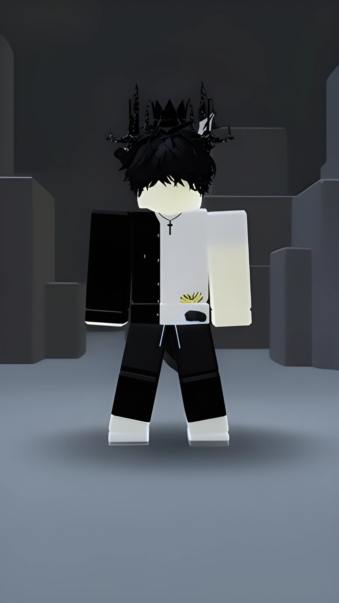Avatar Roblox dạng khối đứng chính diện, đội vương miện gai đen và đeo mặt dây chuyền thánh giá nhỏ.